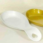 زیر قاشقی کنار گاز فلزی رنگی